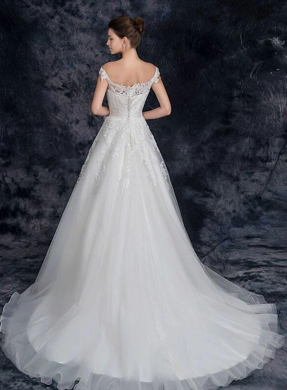 Vestido de novia largo de tul con encaje y hombros descubiertos con apliques